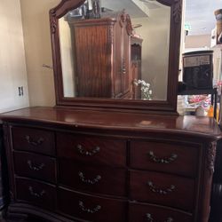 dresser with a mirror