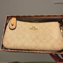 Beige coach purse