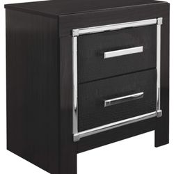 Signature Design By Ashley Kaydell Glam 2 Drawer Nightstand With Faux Alligator Panels & Chrome-Tone Accents, 24.41" Tall, Black ***It Has A Dent On T