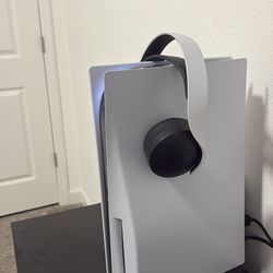 PlayStation 5 with headphones