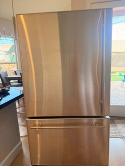 Stainless Steel Bottom Freezer Refrigerator. Jenn Air