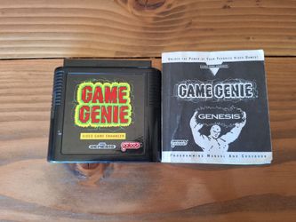 Game Genie (Genesis) with original manual *UNTESTED*