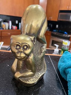 Brass monkey (solid)  9” tall stamped 1980 from Korea