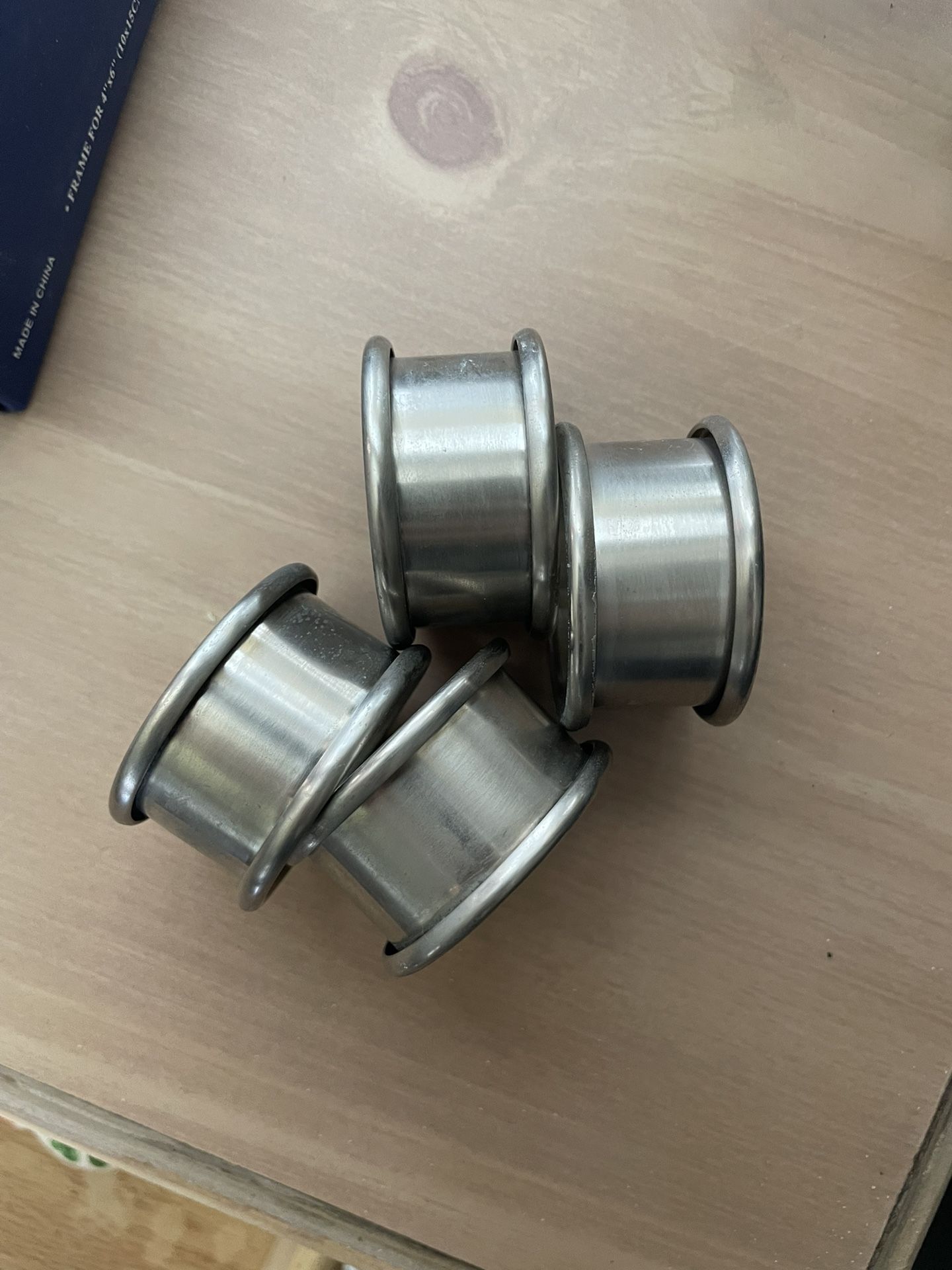 Vintage Set of 4 Stainless Steel Napkin Rings for setting the perfect atmosphere