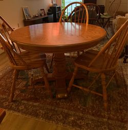 Oak pedestal Dining table and chairs