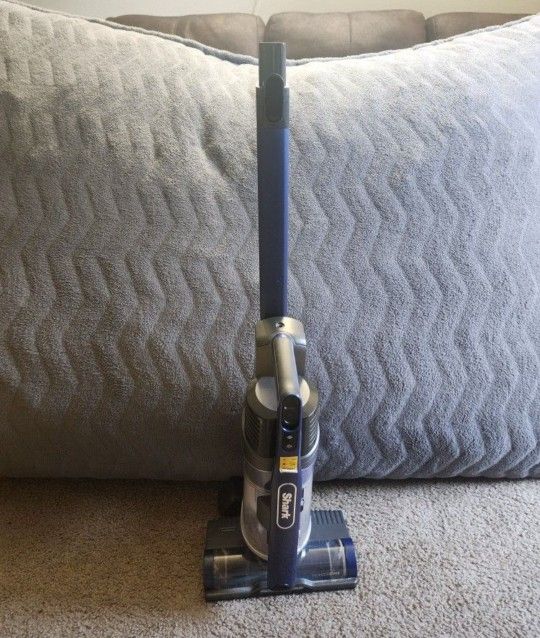 Shark Cordless Pet Plus Vacuum in good condition with charger.