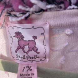 Nice sweater with poodle on it
