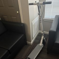 WHITE OKAI (NEW USED )SCOOTER