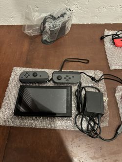Brand New Blacked Out Nintendo Switch With Wrist Band 