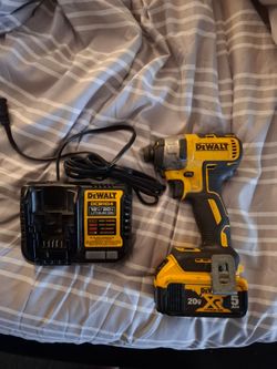 Dewalt xr BRUSHLESS impact driver with battery and charger $120