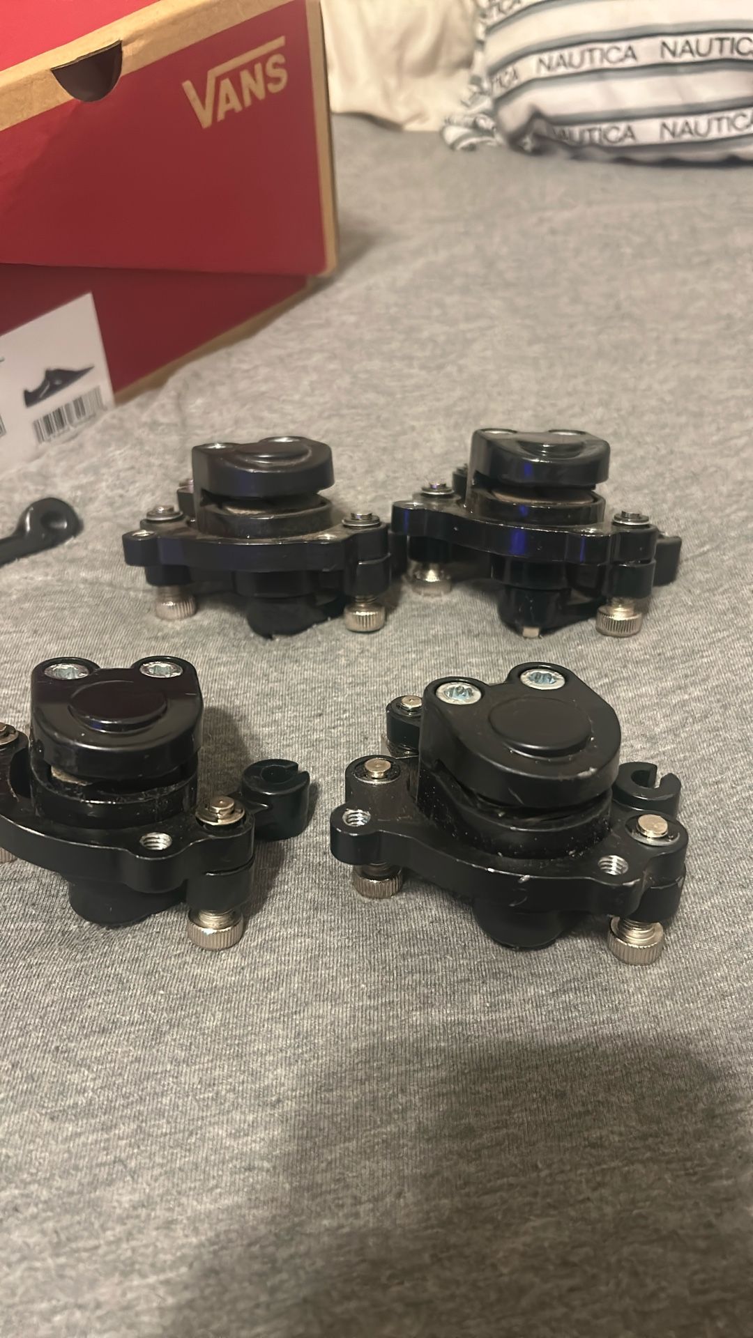 Four Black Minibike Brakes