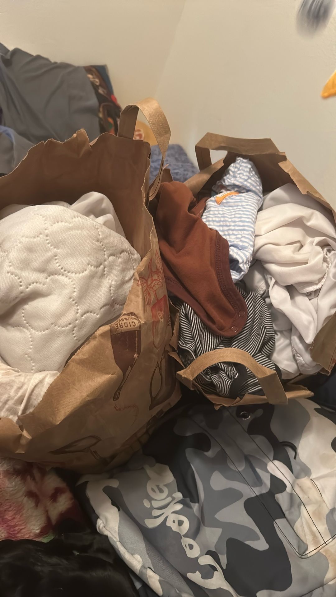 Few Baby Clothes And Sheets For Crib Or Bassinet