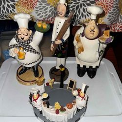 A collection of whimsical resin decorative chef figurines.