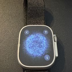 Apple Watch Ultra 49mm Titanium + Multiple Apple Bands + Charger and base