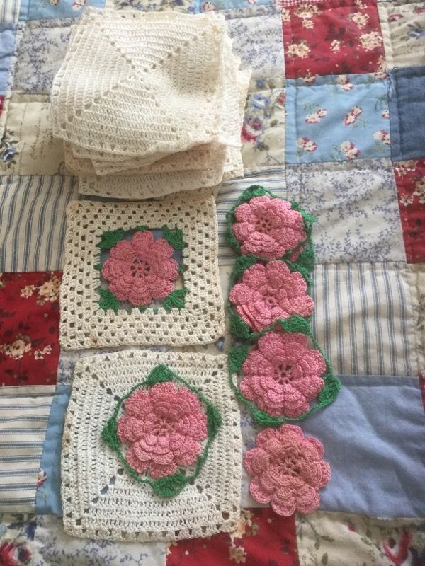 Hand crocheted squares with 🌺