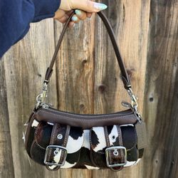 Coach “Ashton” Cow Print Purse
