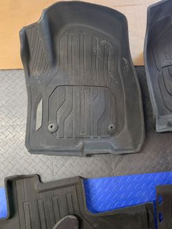 GMC Sierra floor mats and under seat storage