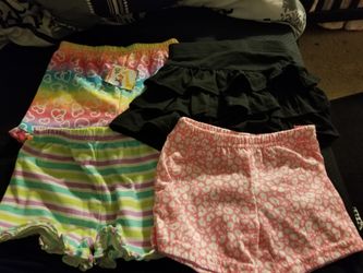 Toodler shorts and 1 black skirt