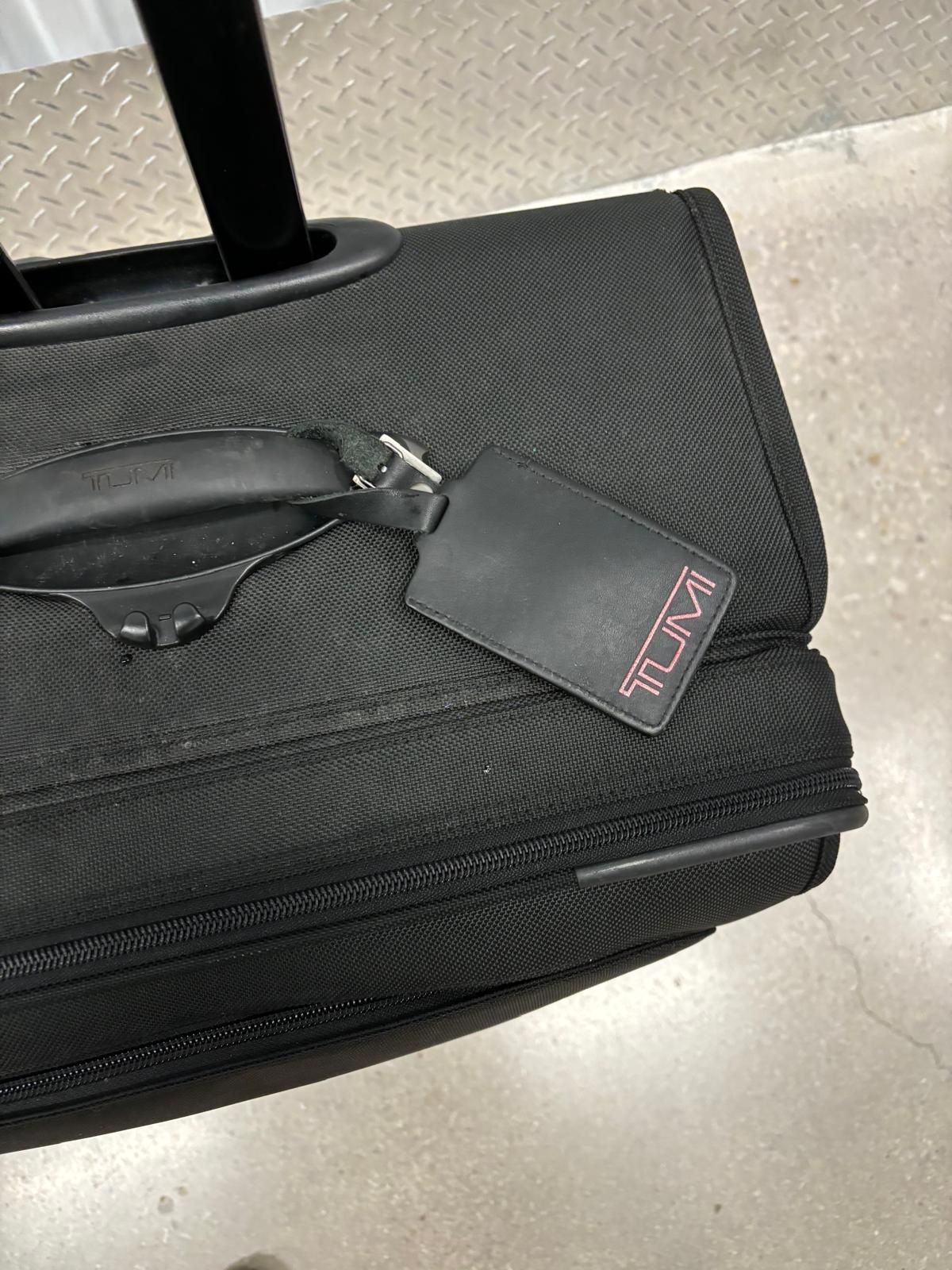 25” Tumi large luggage black $200-Wow-wont last!