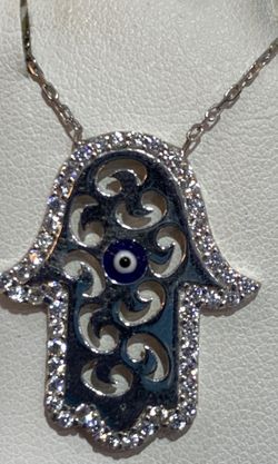 Sterling silver hand of God necklace with an evil eye