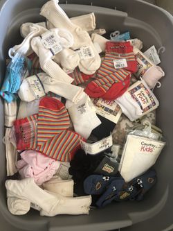 CountryKids and Jefferies Socks. Eight(8) full containers all new with tags. Boys/girls socks/tights. Ages 3M to 14 yrs