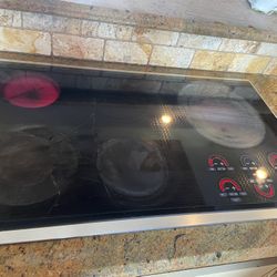 Wolf Electric Stovetop And Double Wall Oven And Sub Zero Fridge