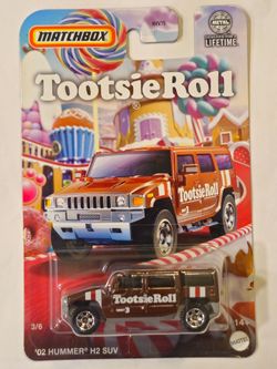 MATCHBOX # 3 OF 6 . TOOTSIE ROLLS CANDY SERIES . 2002 HUMMER H2 SUV .