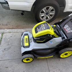 Lawn Mower Ryobi  Self Propelled  AWD  C/W Battery and Charger Used Like New As Is