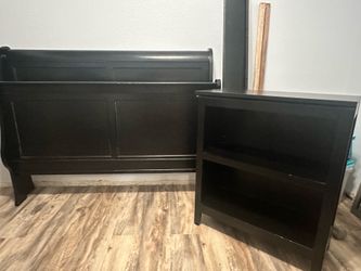 Black Sleigh Bed and Book Shelf