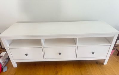 White TV stand or media console with 3 drawers and plenty of storage space.