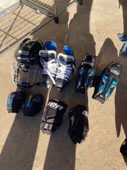 Bauer youth hockey helmet, skates, gloves and pads
