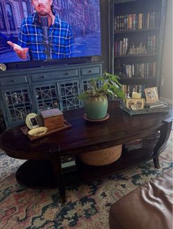 Dark Wood Oval Coffee Table with Lower Shelf