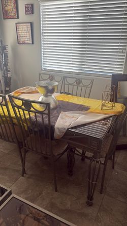 Six chair dinette set and wine console and coffee table with two end tables