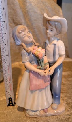Replica Of Vintage Girl And Cowboy