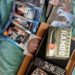 BLUERAY  PLAYER  & 2 BOXES  OF  DVD VIDEO'S 