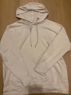Cream colored Vuori Halo Hoodie