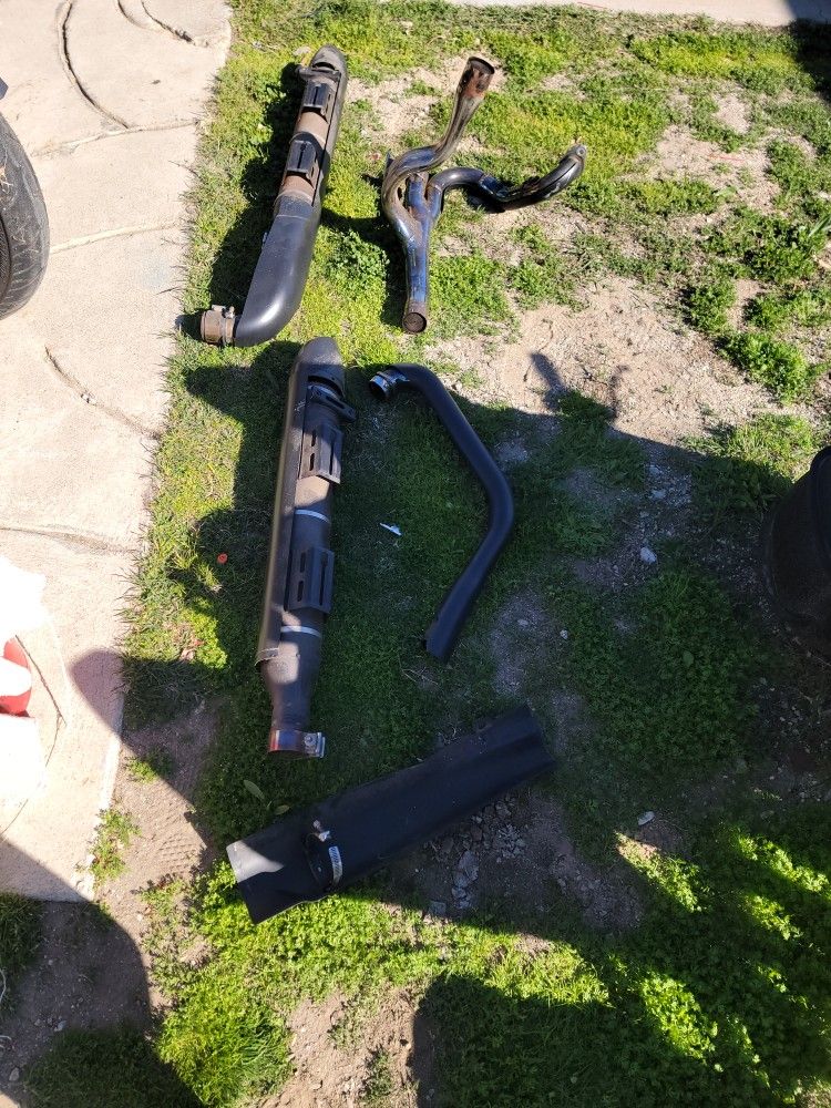 Complete Black Exhaust For A Victory Cross Country