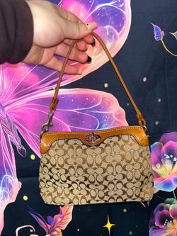 Coach turn lock bag
