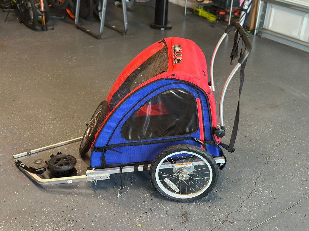 Instep Quick-N-Lite Double Tow Behind Bike Trailer and Stroller for 2