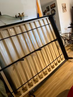 Queens bed mattress with the frame