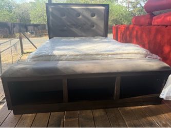 Brown queen, size bed frame with mattress and Buxby