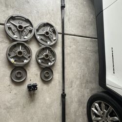 Weight bar + 130lbs+ Clamps 