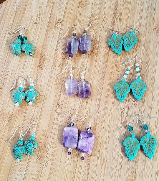 Assorted Amethyst and Reconstituted turquoise earrings. Diamond shaped beads are Swarovski crystals and round are czech glass. 