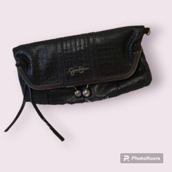 Like new Jessica Simpson large ball clutch 