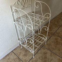 Stand plant 27 inches tall 14 inches long 1 ft  wide