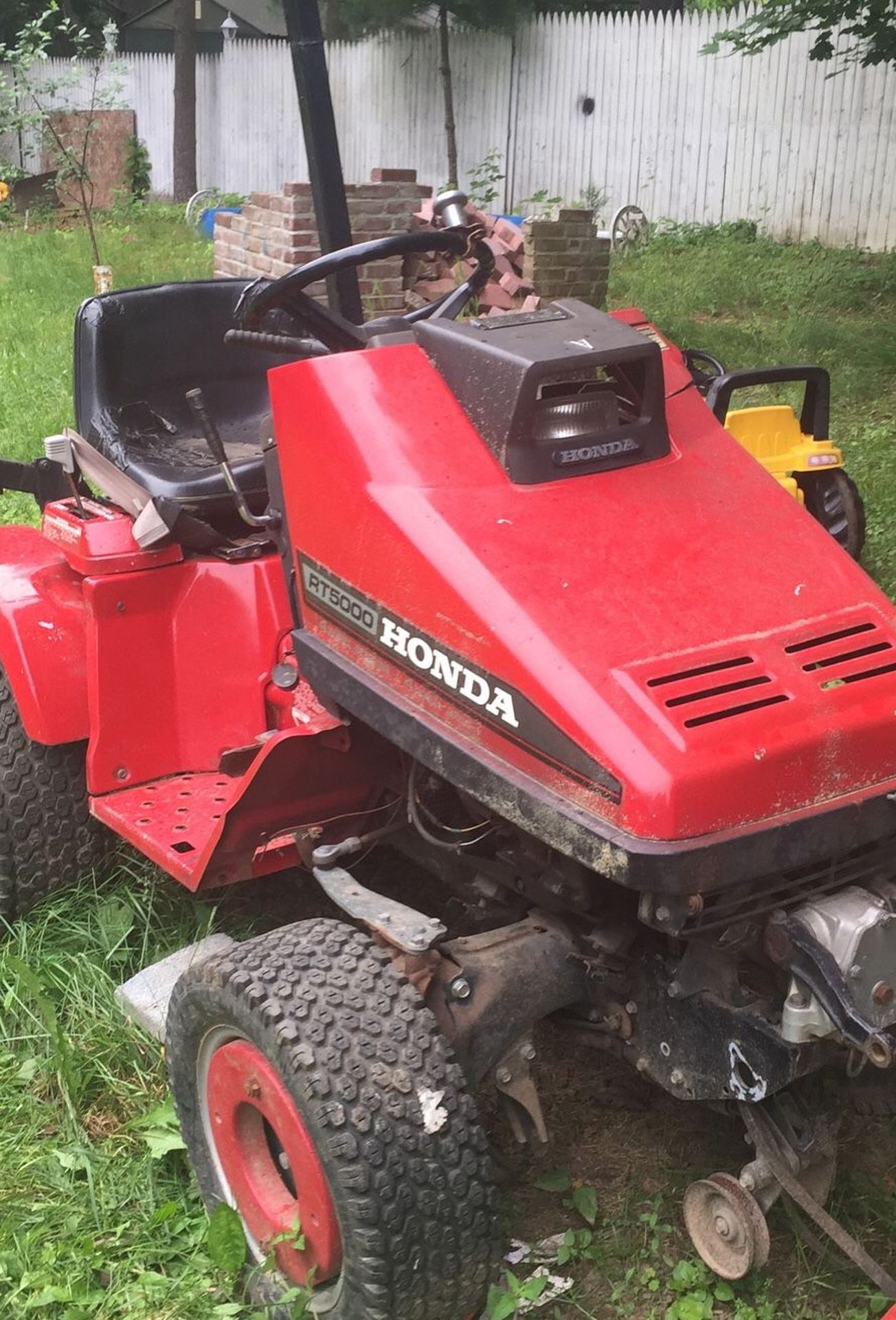 Honda RT5000 tractor with rear clipper attachment and snow blower