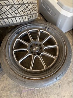XXR 557 18x8 1/2 rims with tires