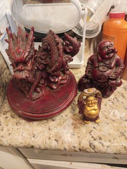 Chinese dragon and w Buddha's. All for $12