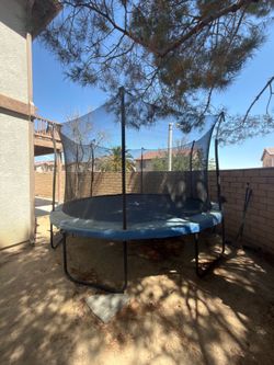 Trampoline with net