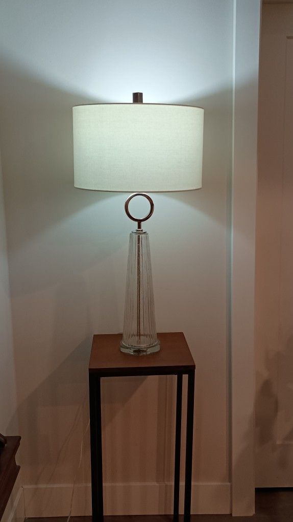 Set Of 2 Unique Tall Table Lamps By Uttermost With The Hand blown Transparent Glass Base And Chrome Trim H32"